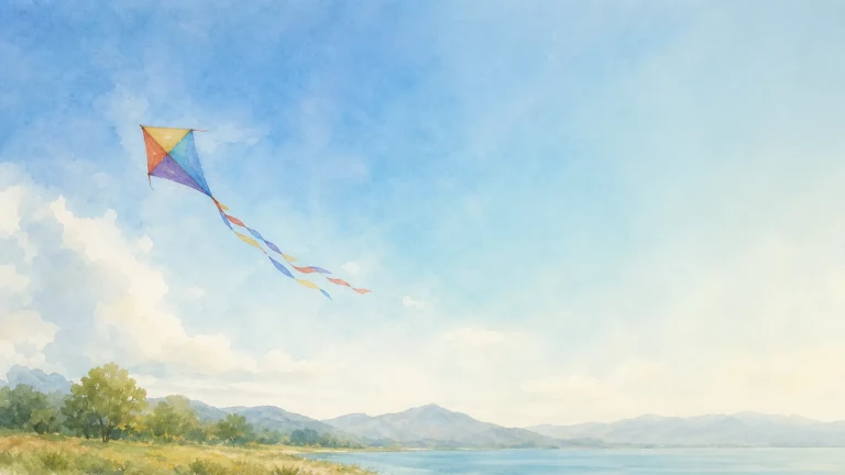 蓝天与湖山上空飞着一只彩色风筝